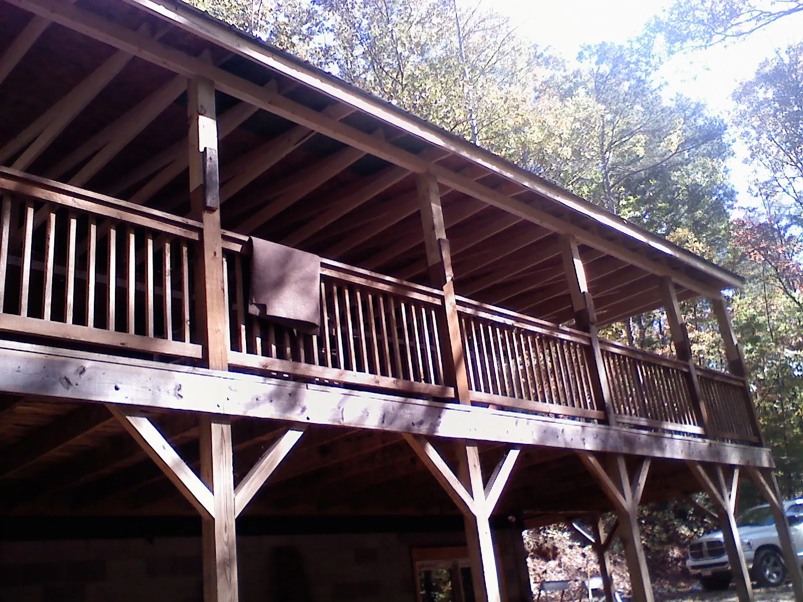 Timber framing under a new elevated porch and deck — Roof Leak Repair in Urbandale by Roofing Brothers